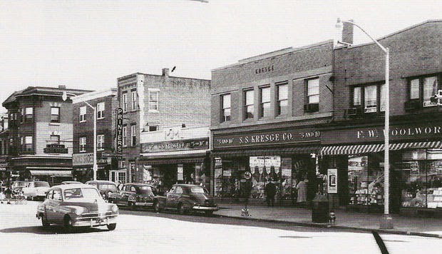 Kresge's and Woolworth's five-and-dime storefronts on Broad Street, Woodbury, with 1950s cars parked along the curb